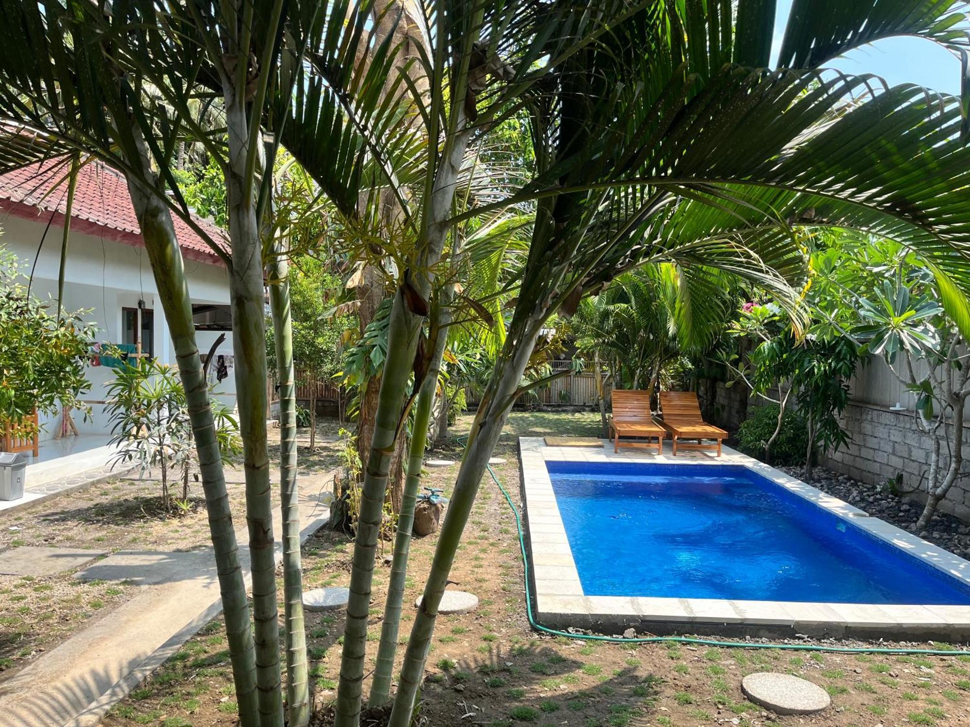 Kebun Homestay Kuta  Exterior photo